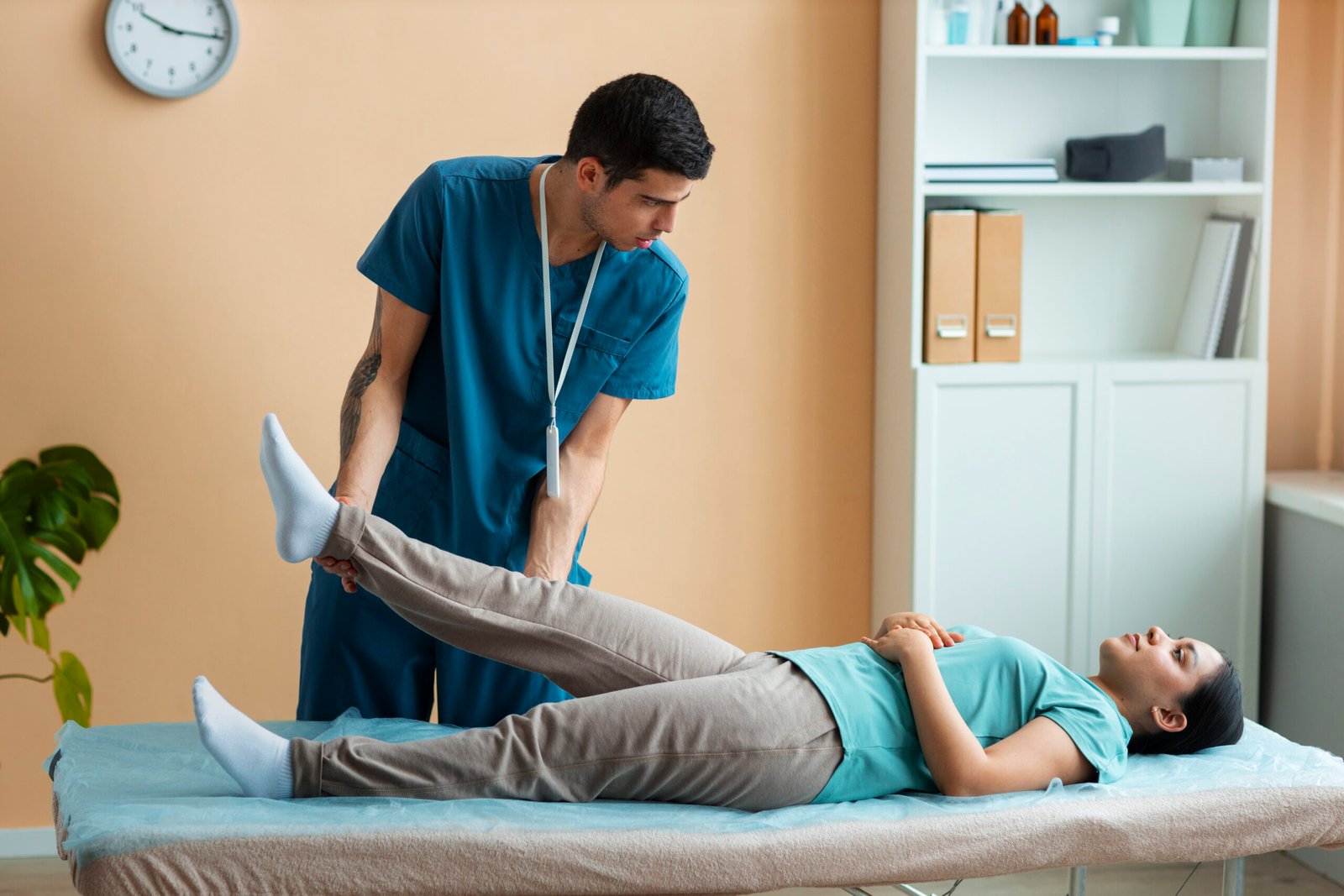 Doctor Helping Patient Rehabilitation Scaled